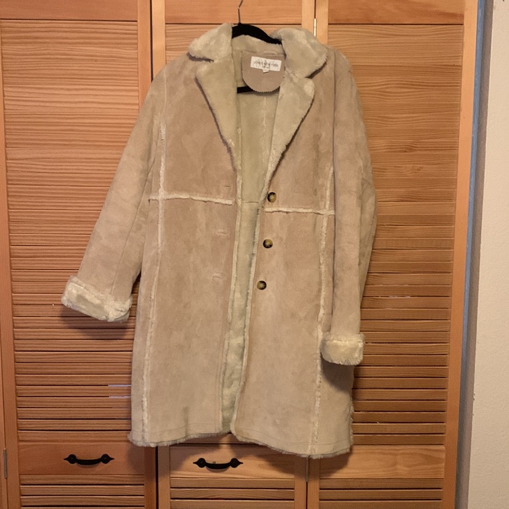 Gently used Jones New York Sports fur lined leather jacket